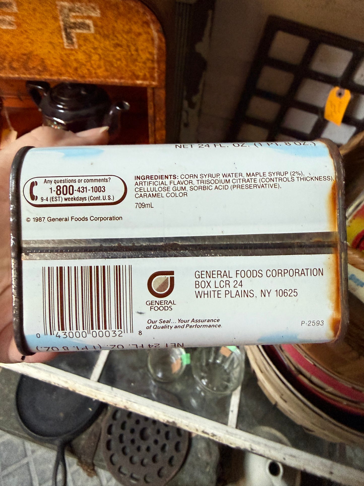 Tin — Log Cabin syrup