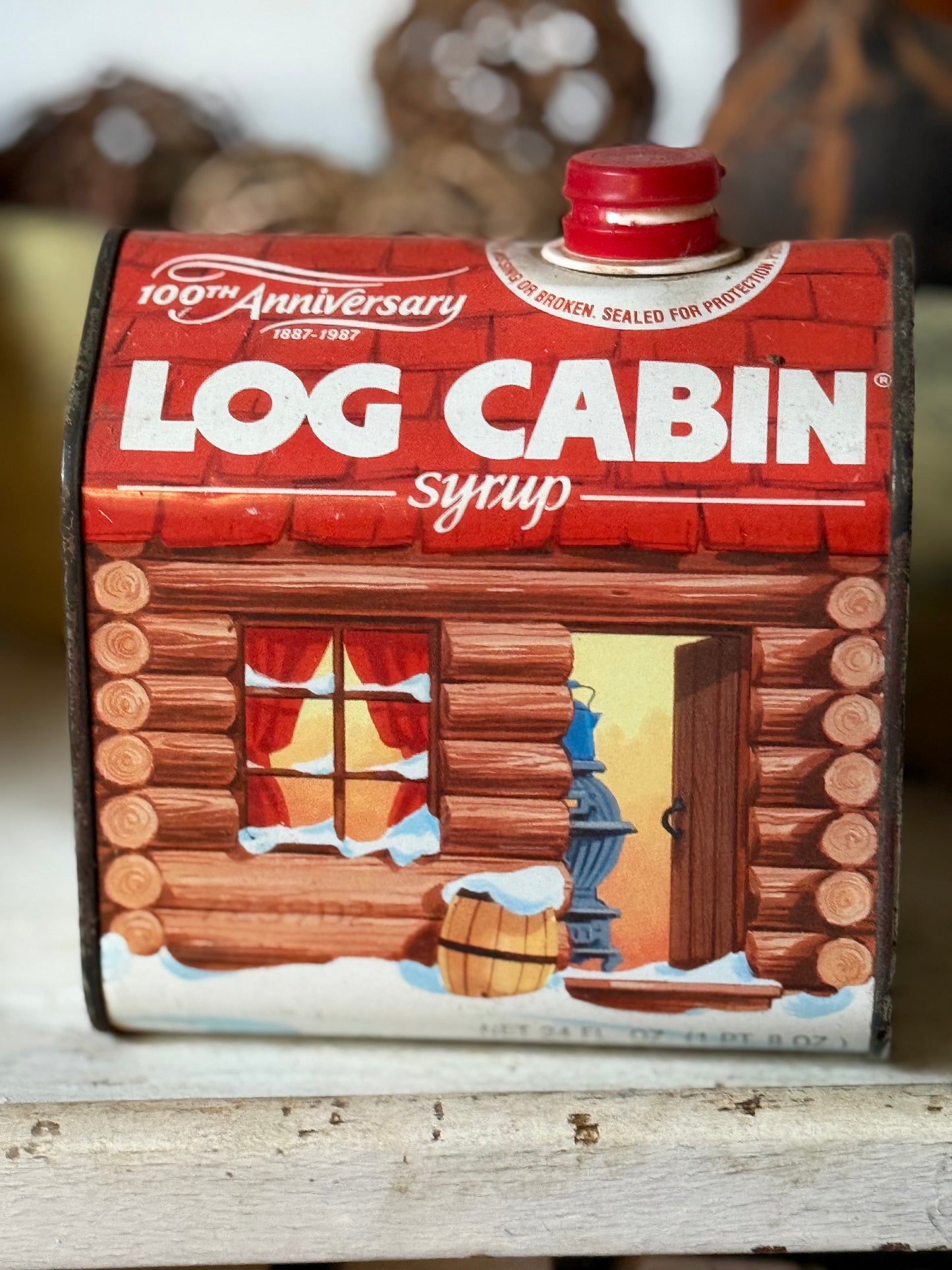 Tin — Log Cabin syrup